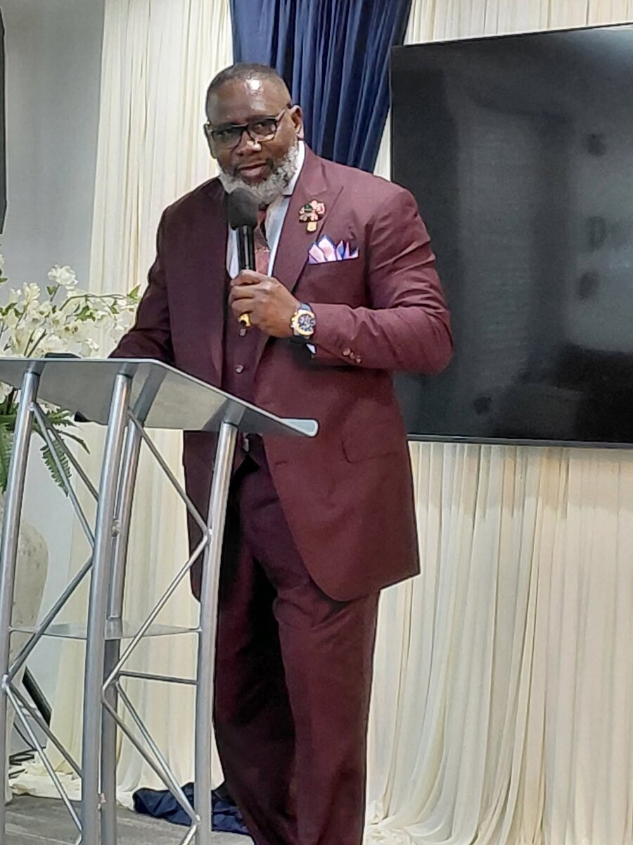 Bishop George E. Gibson II preaching from the pulpit
